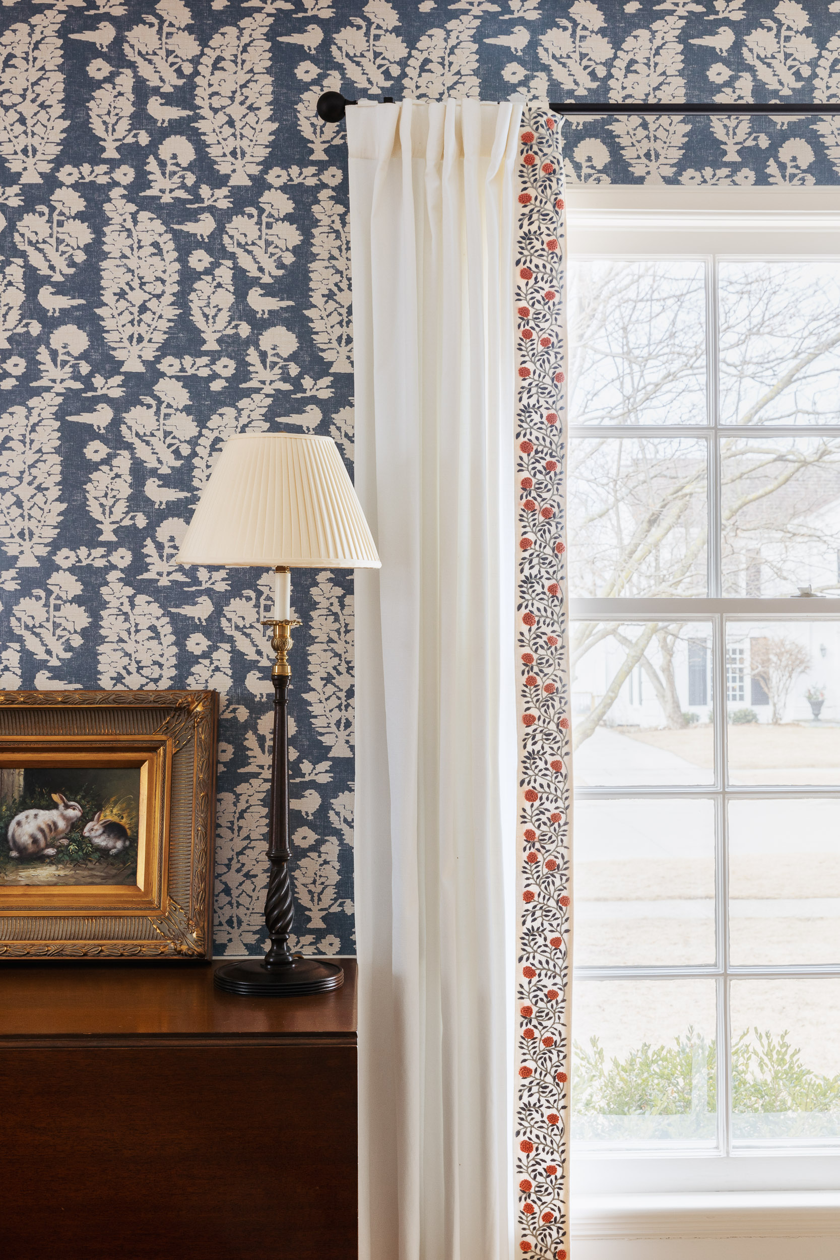 Embroidered Schumacher tape sewn to draperies